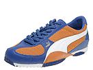 Buy PUMA - Toure (Golden Poppy/Olympian Blue/White) - Men's, PUMA online.