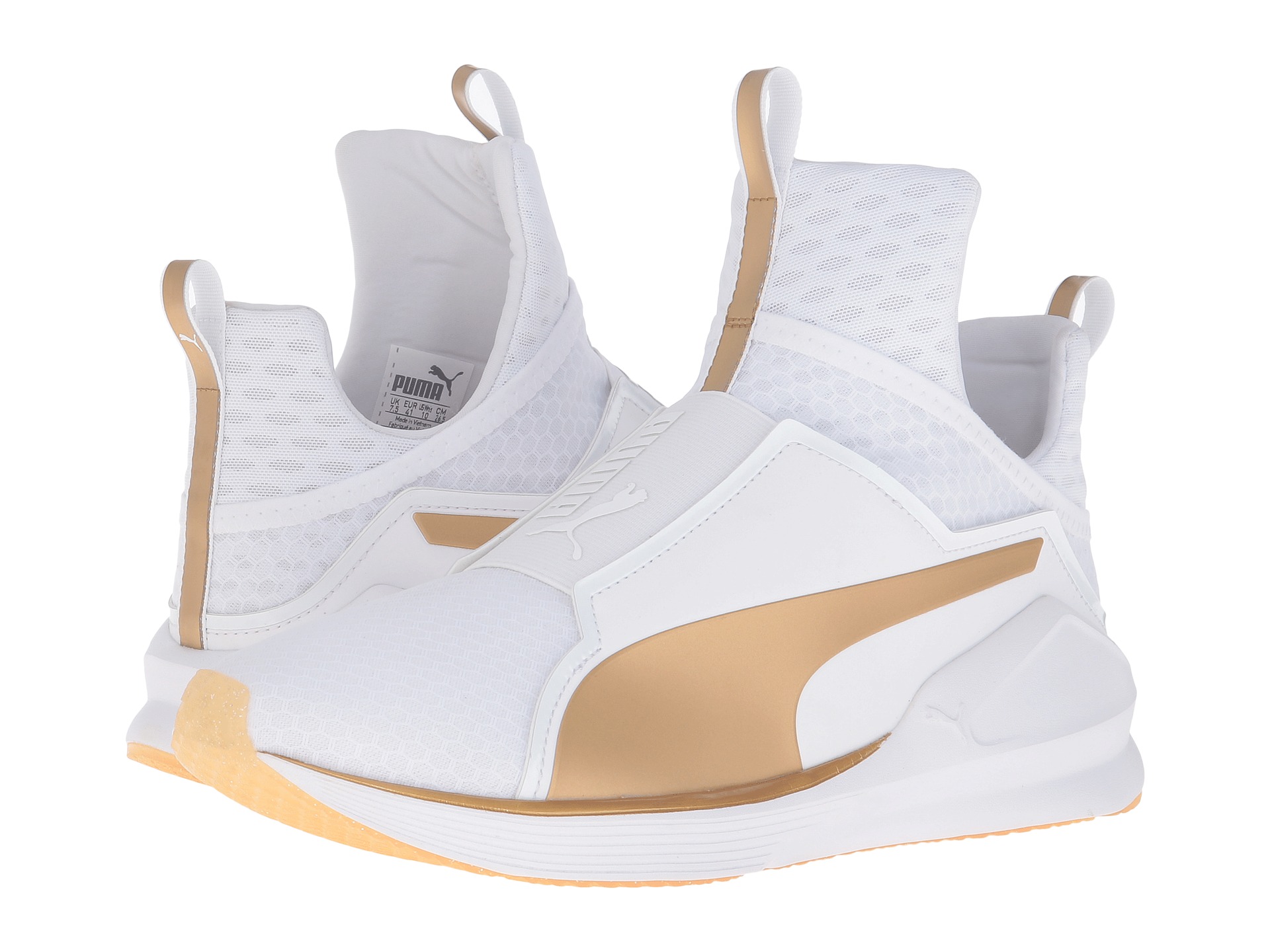 white and gold puma handbag