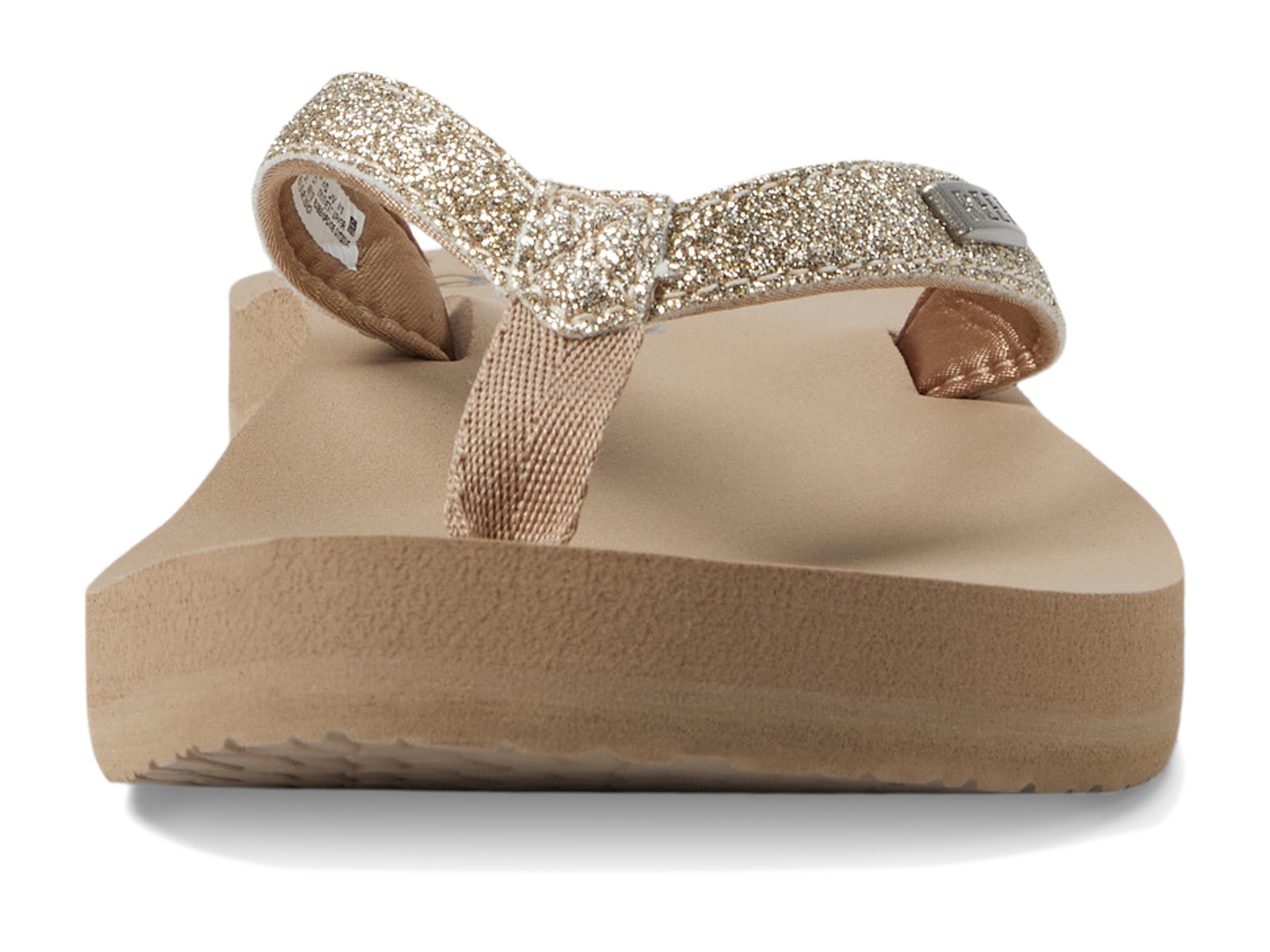reef star cushion almond